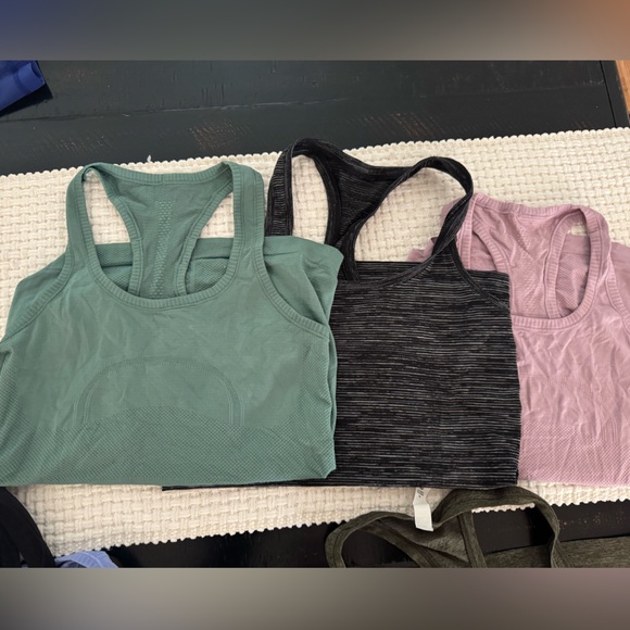 7 lululemon swiftly tanks. Gently used. - Picture 3 of 5